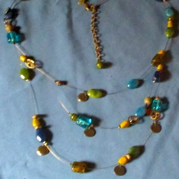 3/$20 CHICO’S GOLD TONE MULTI COLOR FLOATING GLASS BEAD TRIPLE STRAND NECKLACE - Picture 1 of 3